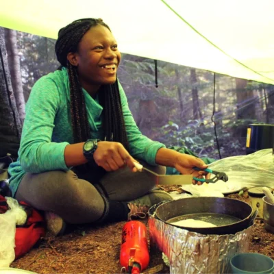 Cooking dinner under a tarp in the Northeast.