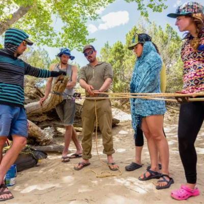 Students being taught essential skills on an instructor course, in the Rocky Mountains.