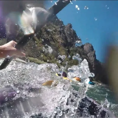 A student with a body cam captures the action on a kayak.