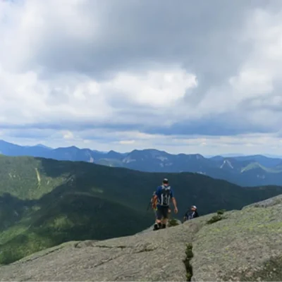 Backpacking students hike high up in the Adirondacks.