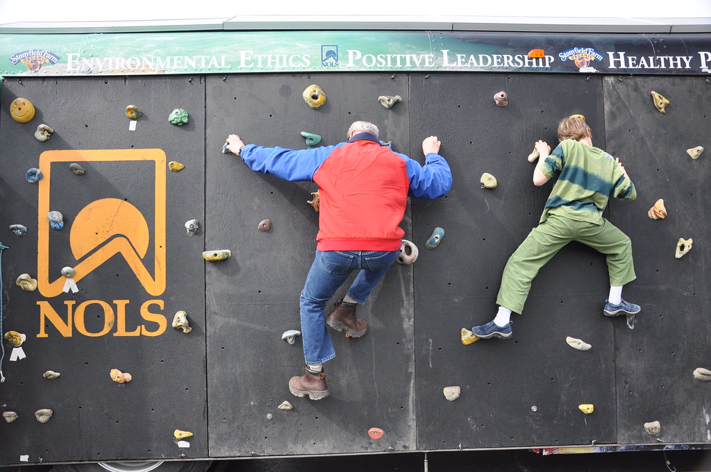 NOLS grad and son climb the wall