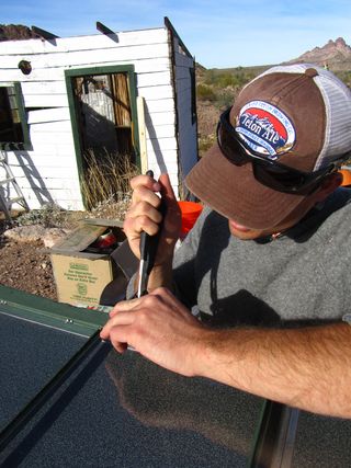 Mark installing window's at the Tilotson House