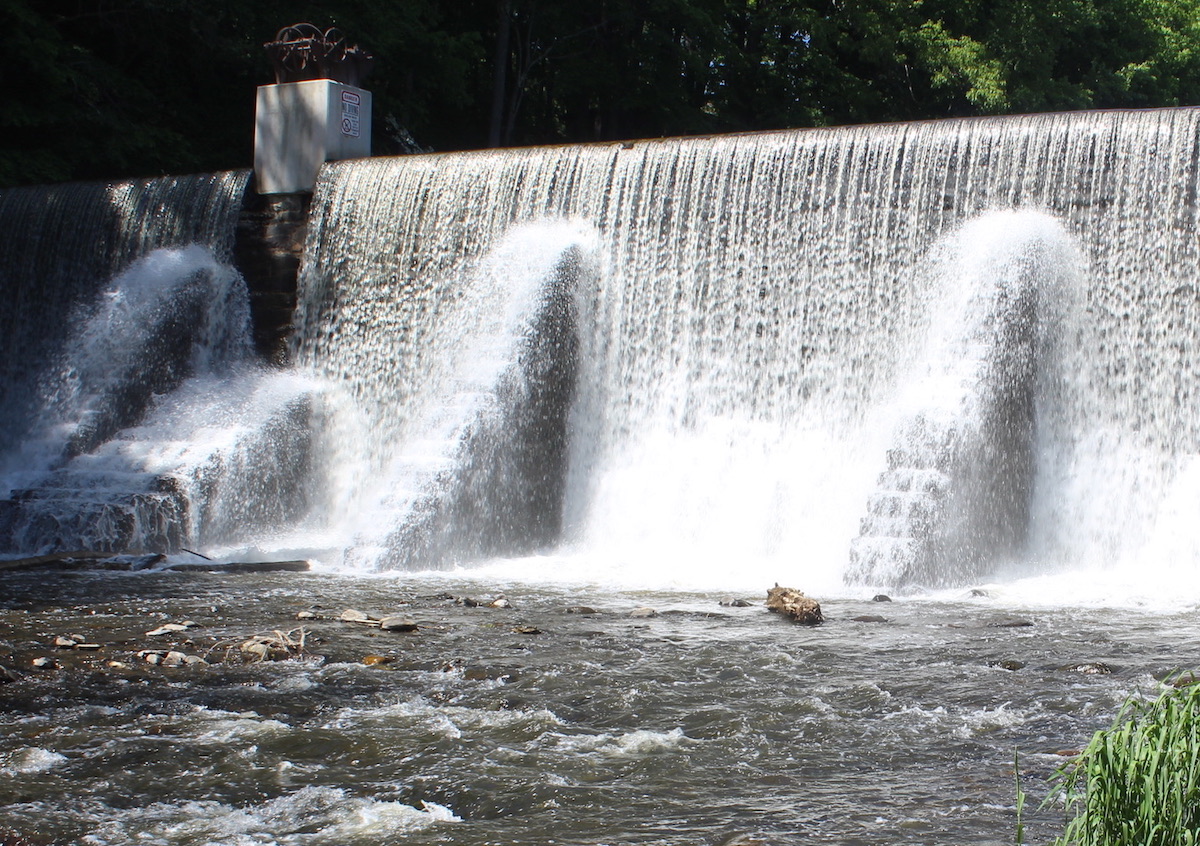 manmade waterfall on a sunny day on New Jersey's Columbia Trail