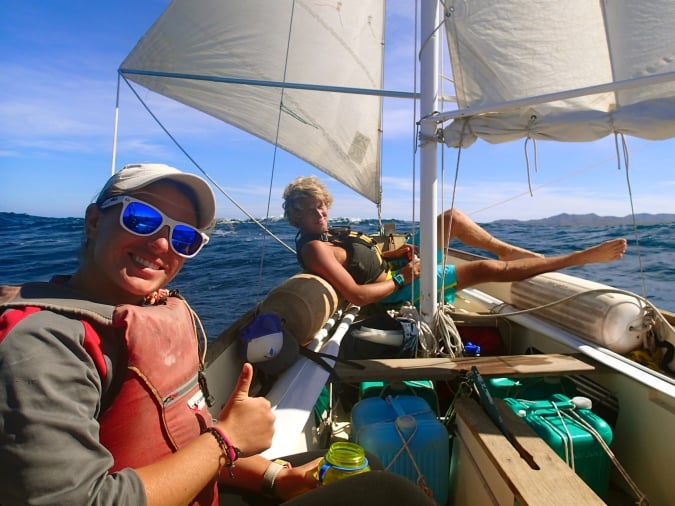 2 gap year students on a sailboat