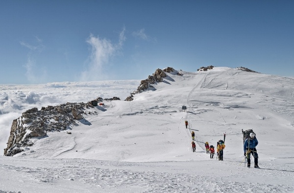 Expedition Denali team hiking toward summit-photo by Hudson Henry