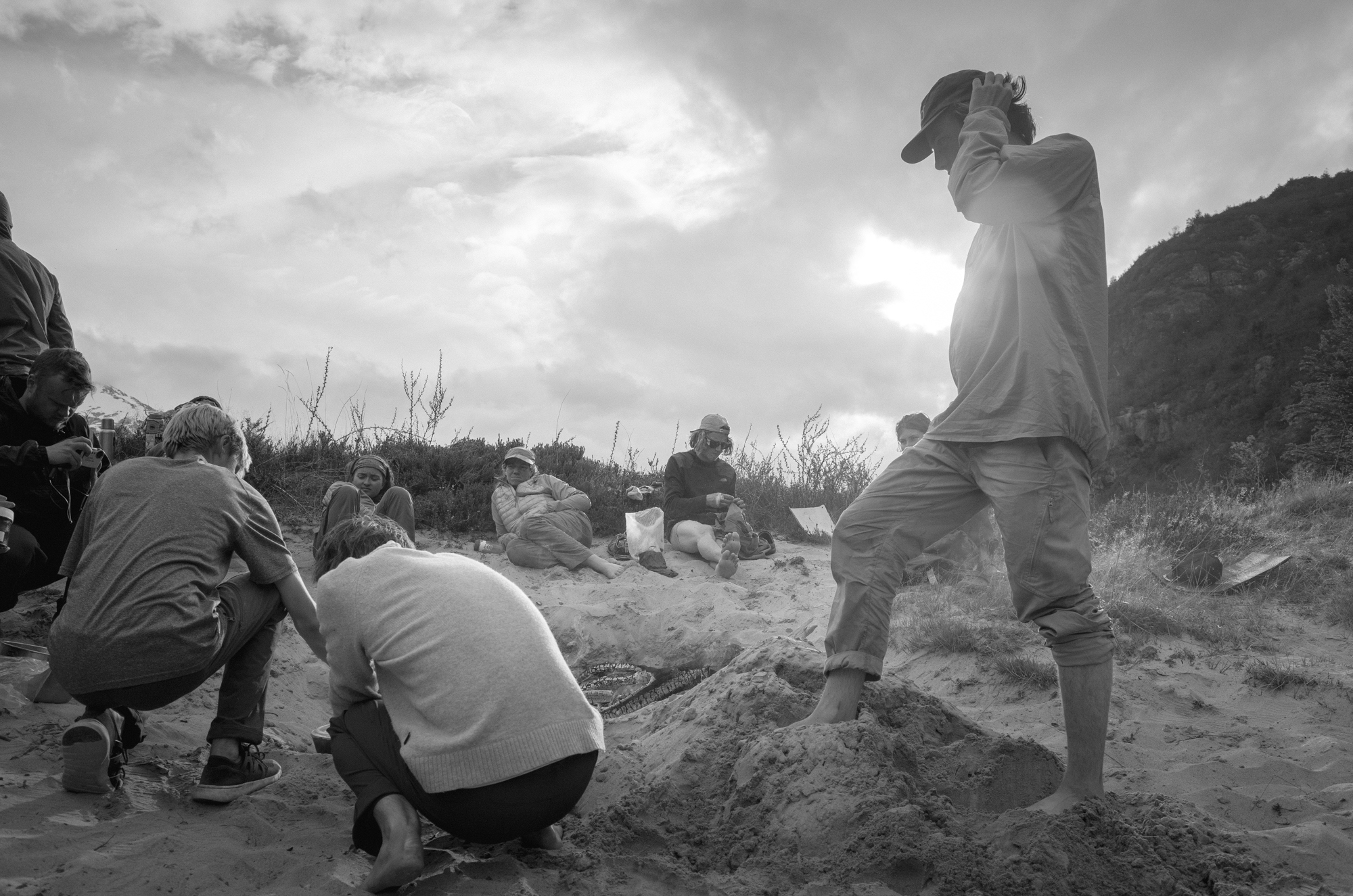 Group cooking on a beach