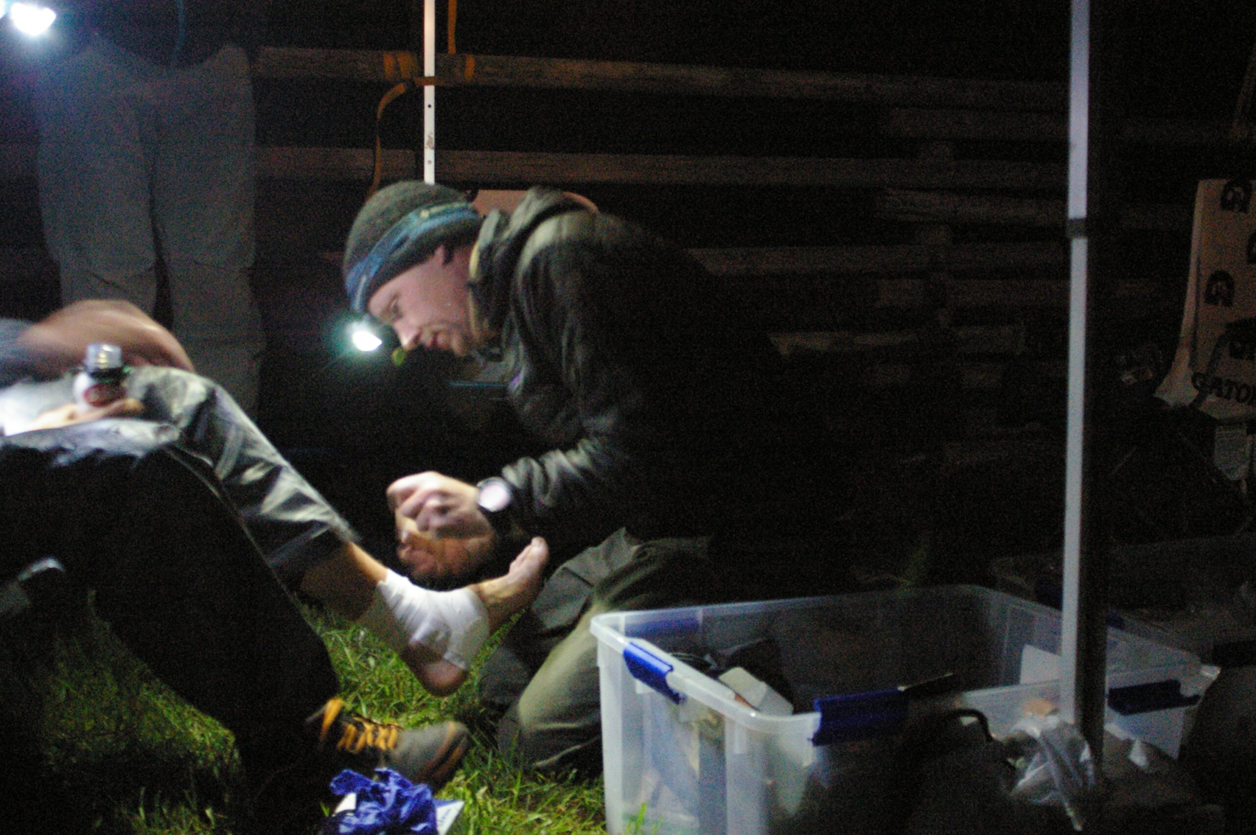 WMI team tends to foot injuries during Cowboy Tough Adventure Race.