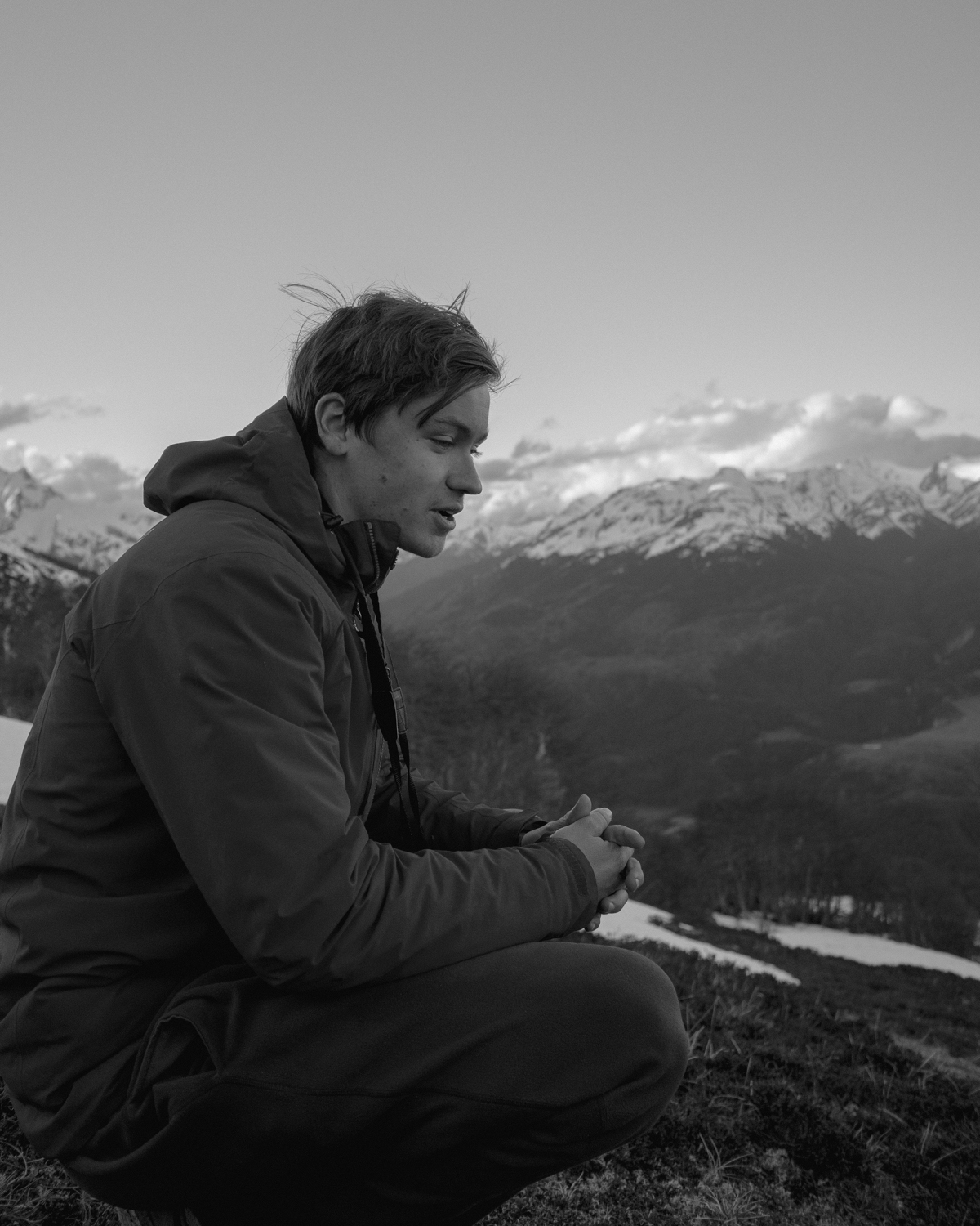 Person with mountains in the backgrou d