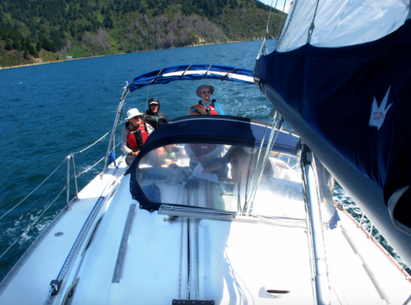 three NOLS students sailing on a New Zealand prime course-photo by David Brown