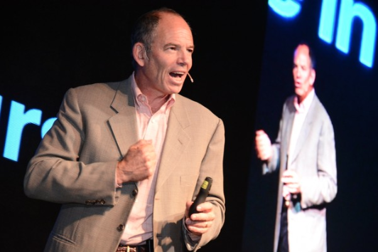 Netflix co-founder Marc Randolph onstage giving a presentation