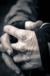 Instructors often use their hands and a ballpoint pen to teach topographic map reading on NOLS courses. Photo courtesy of Alex Chang - Cornell Leadership Expedition.