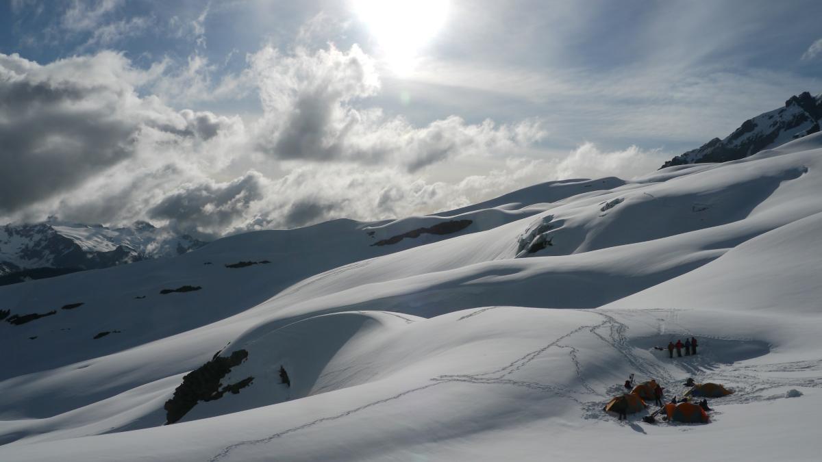 Mountaineering camp nestled in a snow field