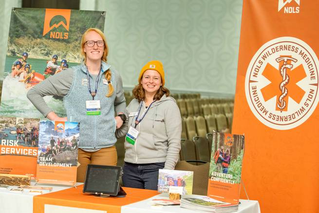 NOLS staff tabling at the WRMC.