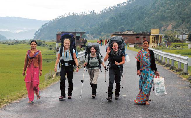 Gap Year Students walking with local villagers from the Kumaon region of the Indian Himalaya.