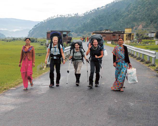 Gap Year Students walking with local villagers from the Kumaon region of the Indian Himalaya.