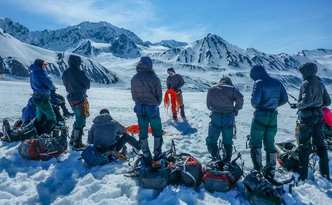 Naval Academy students on a NOLS Custom Education course prepare for a day of mountaineering in Alaska.