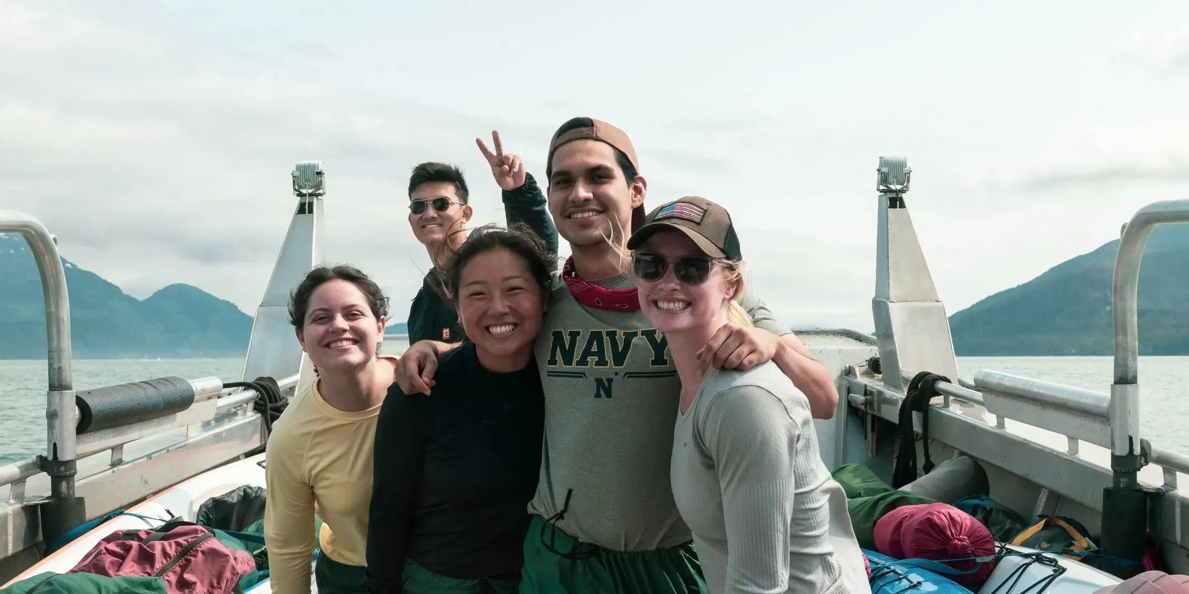 Team collaboration during a wilderness expedition in Alaska
